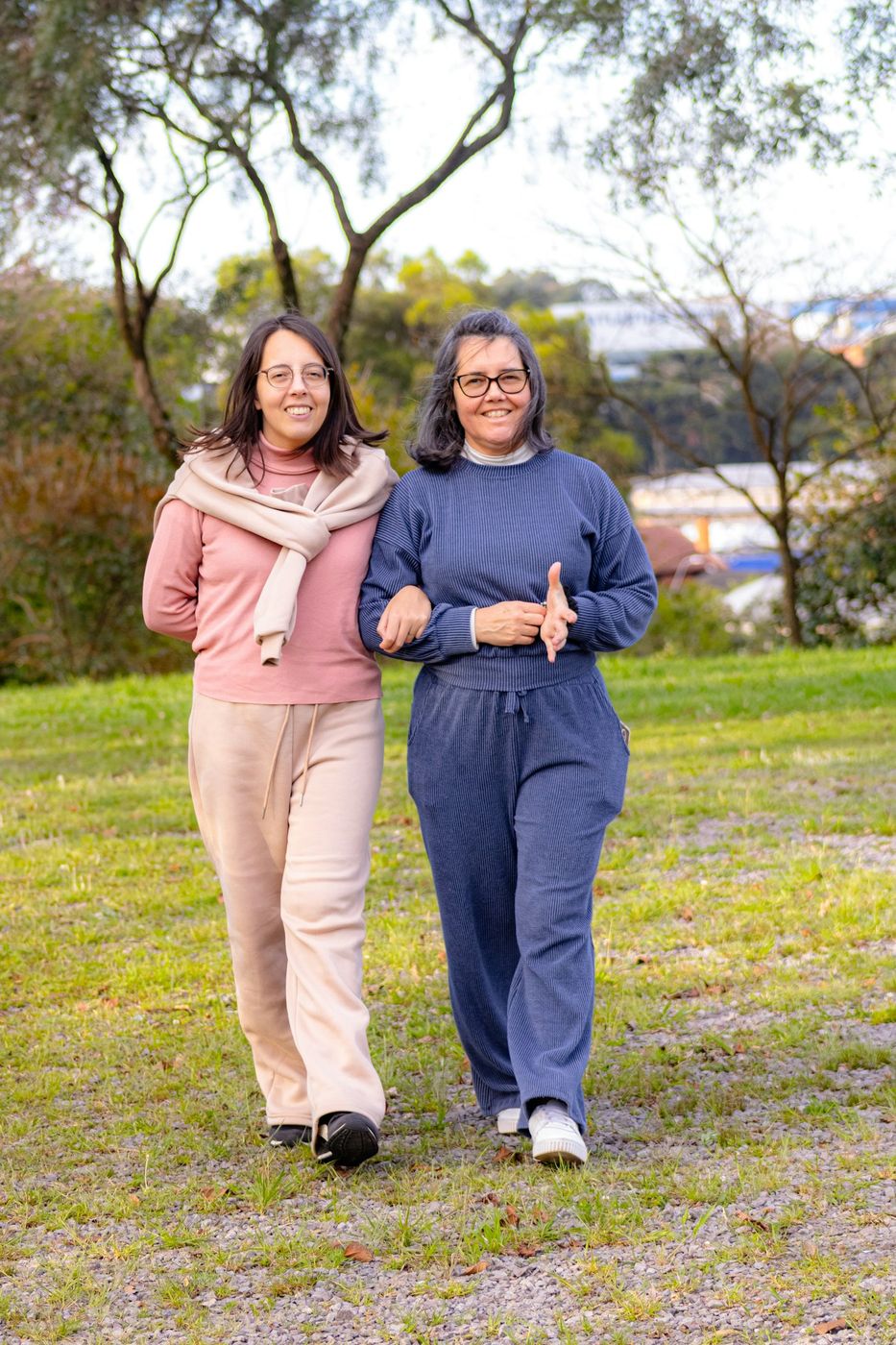 Two people walking outdoors as part of an active lifestyle