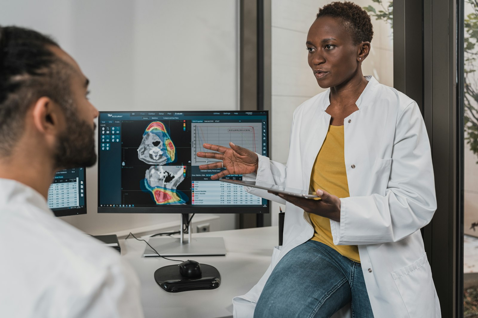 Clinicians consulting in a modern specialist clinic